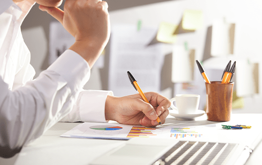 Photo of a person analyzing data